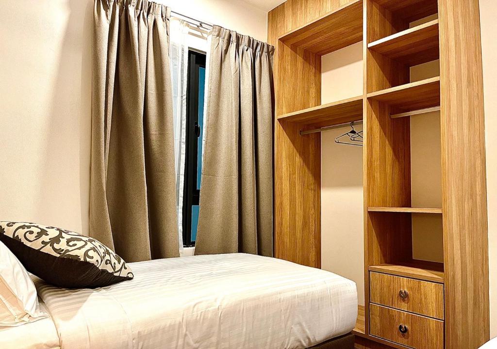 Postel nebo postele na pokoji v ubytování Hotspring 1203 Two Bedroom at Sunway Onsen 4pax