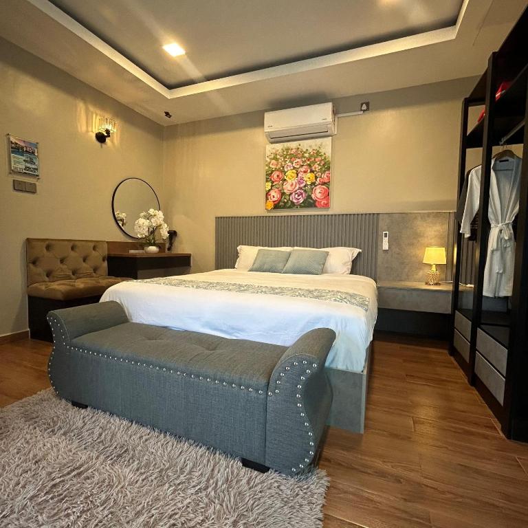 Postel nebo postele na pokoji v ubytování Tijami Villa & Resort