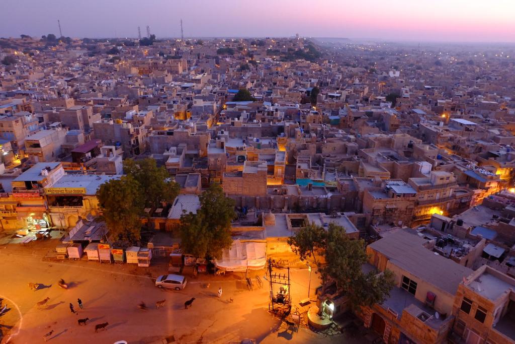 an aerial view of a city at night at Hotel Garh Jaisal Haveli in Jaisalmer