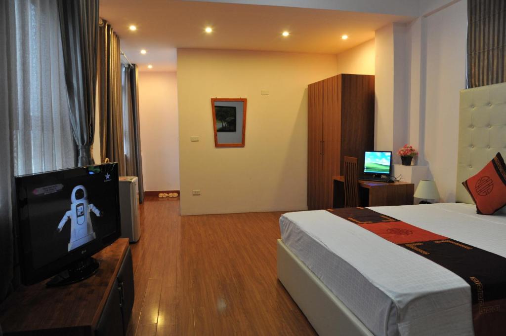 TV a/nebo společenská místnost v ubytování Urban Alley Hotel
