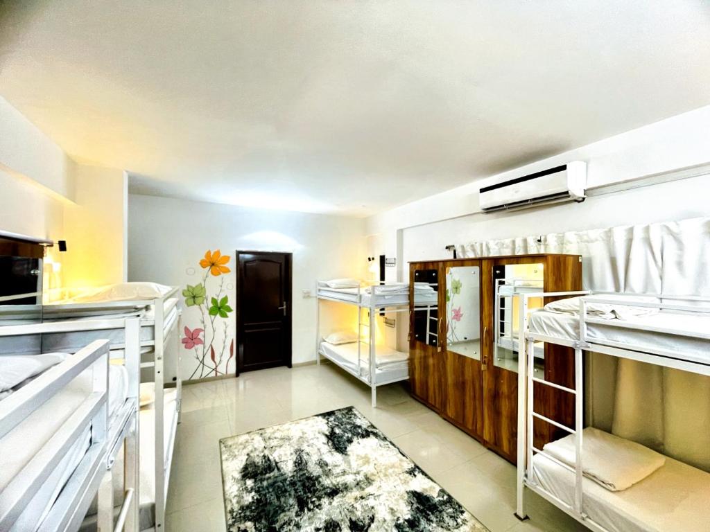 HOSHTEL99 - LUX - Stay, Cowork and Cafe - Luxurious Bungalowにあるベッド