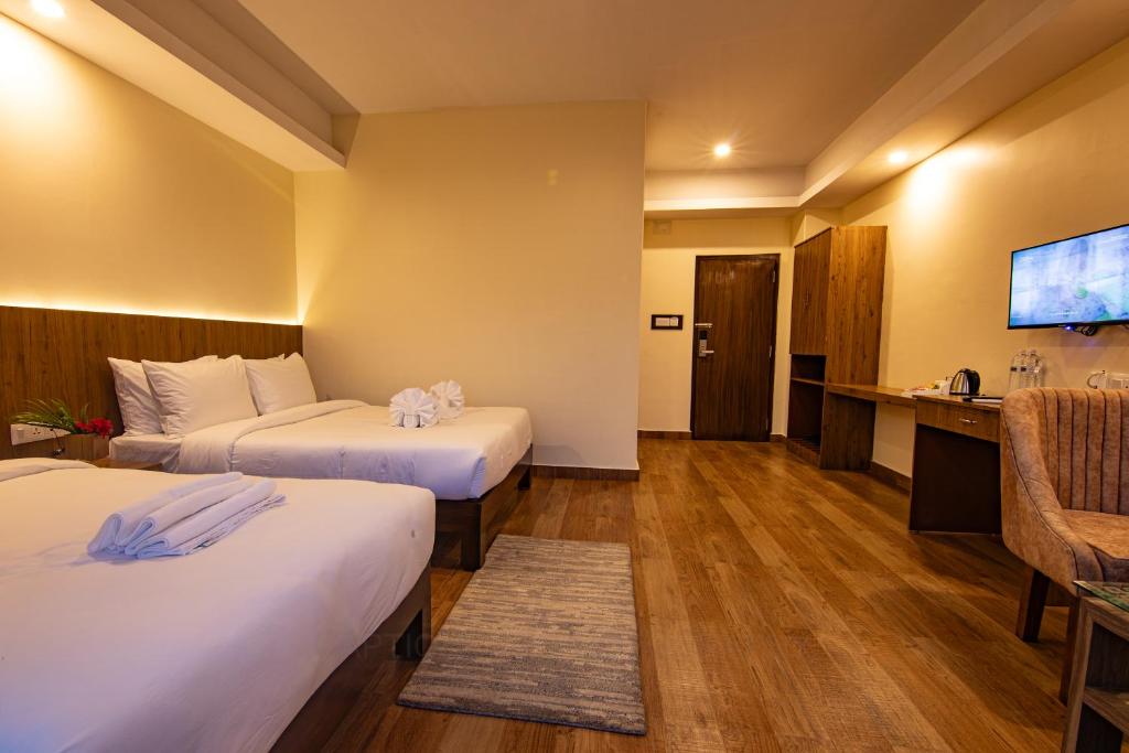 TV a/nebo společenská místnost v ubytování Hotel Dashain