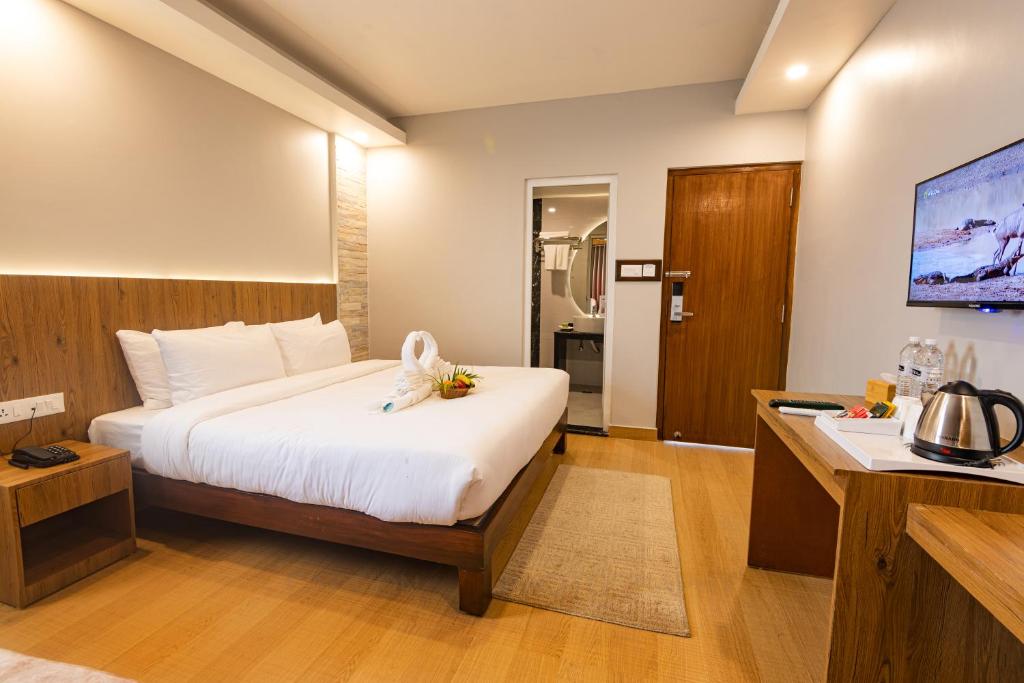 Postel nebo postele na pokoji v ubytování Hotel Dashain