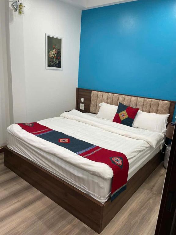 Postel nebo postele na pokoji v ubytování Harmony Haven Hotel