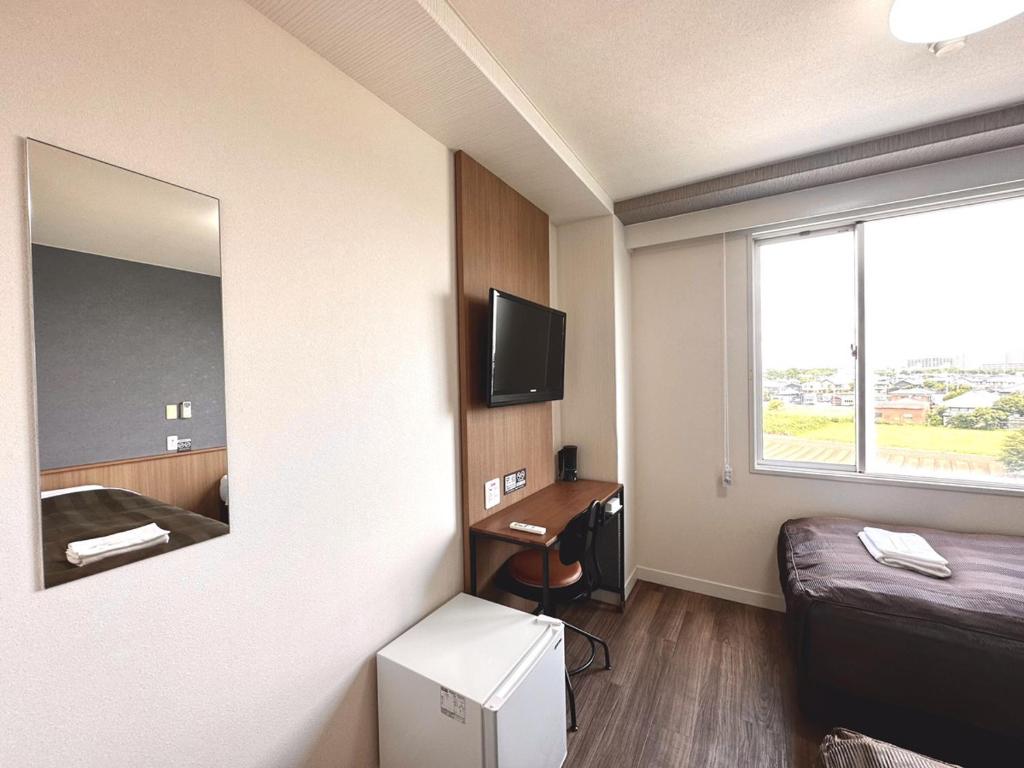 TV a/nebo společenská místnost v ubytování Tabist Tsukuba Sky Hotel