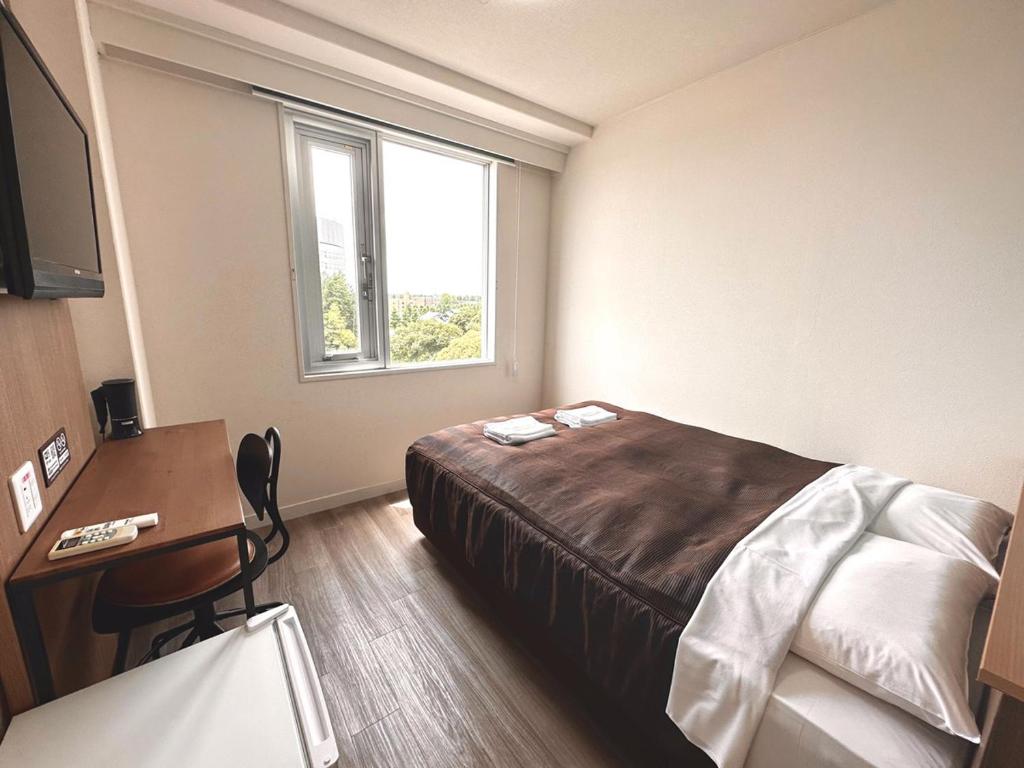 TV a/nebo společenská místnost v ubytování Tabist Tsukuba Sky Hotel