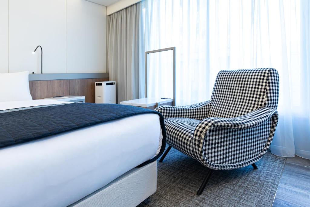 Posezení v ubytování HOTEL THE FLAG Shinsaibashi