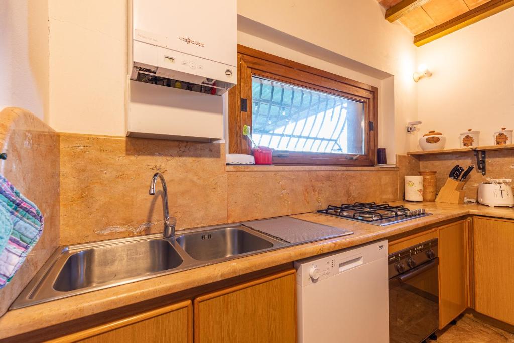 Kuchyň nebo kuchyňský kout v ubytování Il Gugnolo - Casale in Val d'Orcia