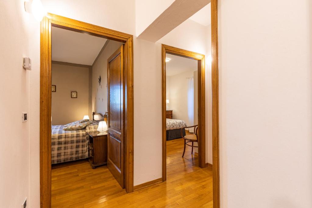 Postel nebo postele na pokoji v ubytování Il Gugnolo - Casale in Val d'Orcia