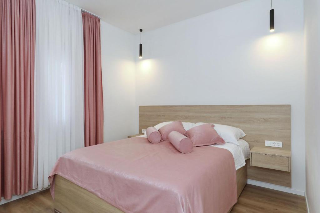 Postel nebo postele na pokoji v ubytování Villa Zrmanja