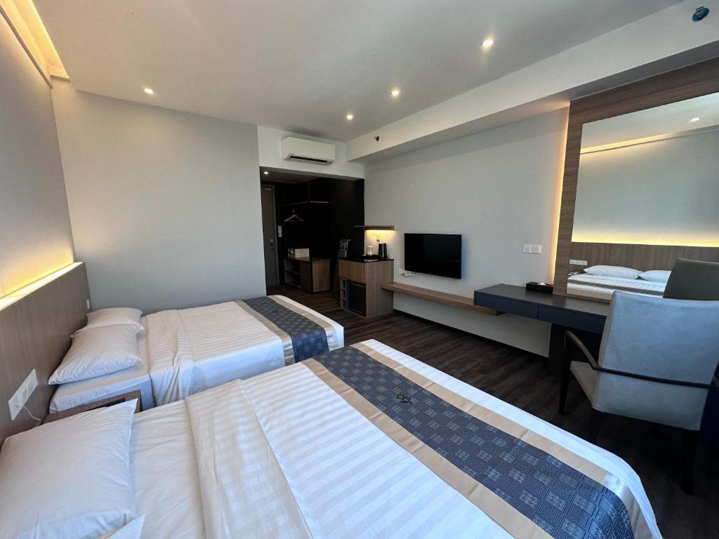 TV a/nebo společenská místnost v ubytování 56 Hotel