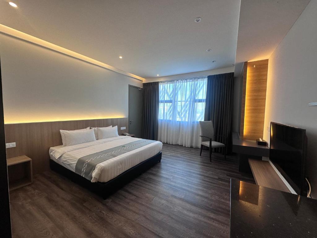 Postel nebo postele na pokoji v ubytování 56 Hotel