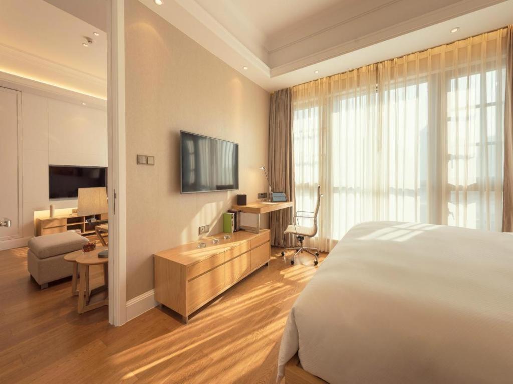 TV a/nebo společenská místnost v ubytování Residence G Nanshan