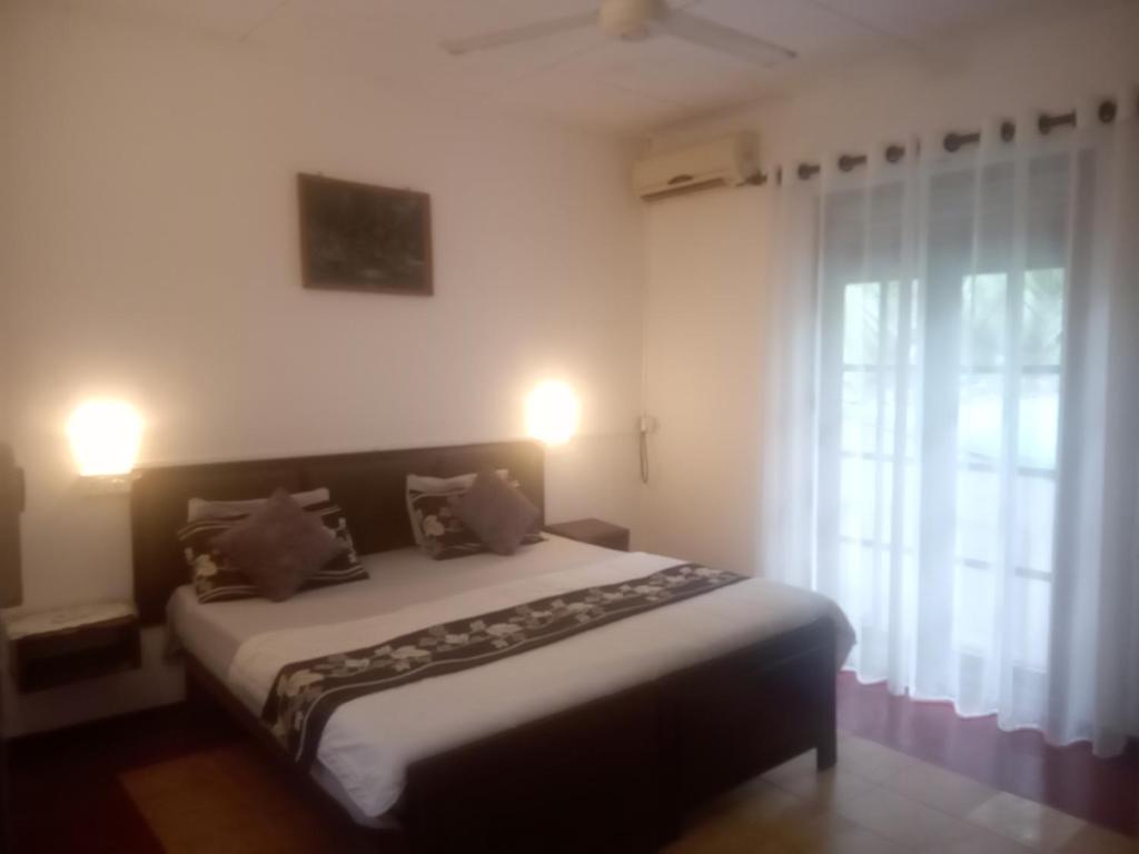 Postel nebo postele na pokoji v ubytování Vidisa Villas