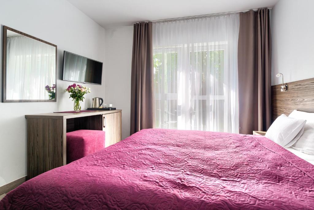 Postel nebo postele na pokoji v ubytování Villa Jodłowa 6