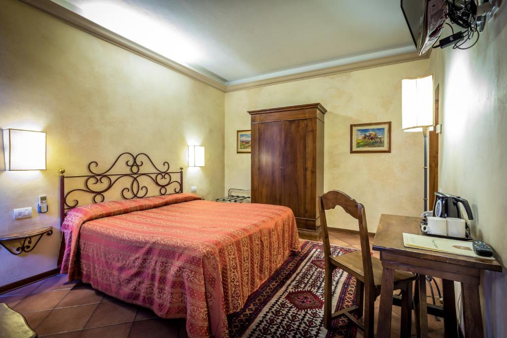 Postel nebo postele na pokoji v ubytování Hotel Mario's