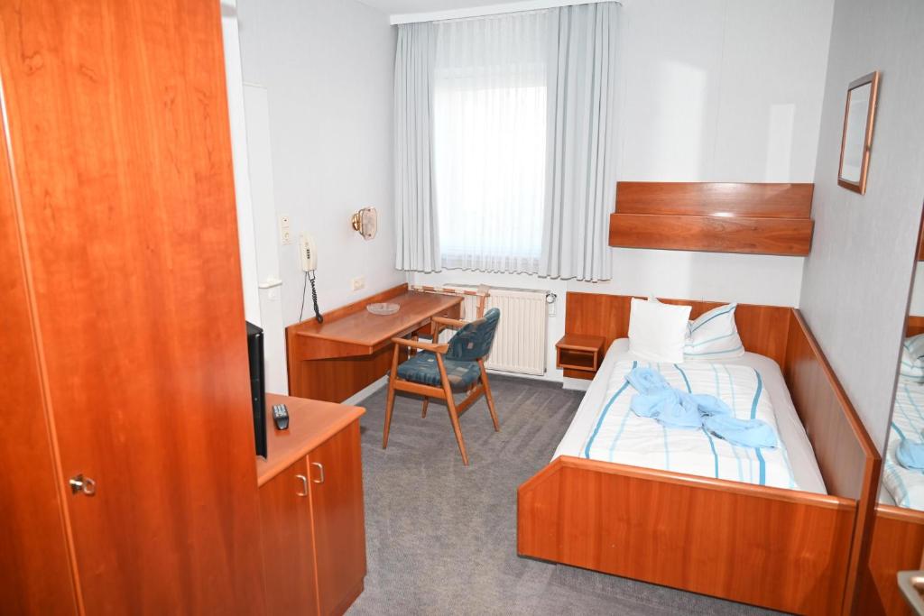 Postel nebo postele na pokoji v ubytování Hotel Passat