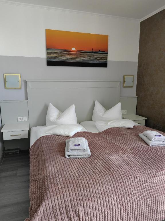 Postel nebo postele na pokoji v ubytování Hotel Passat