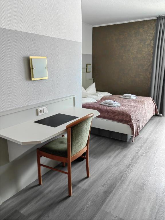 Postel nebo postele na pokoji v ubytování Hotel Passat