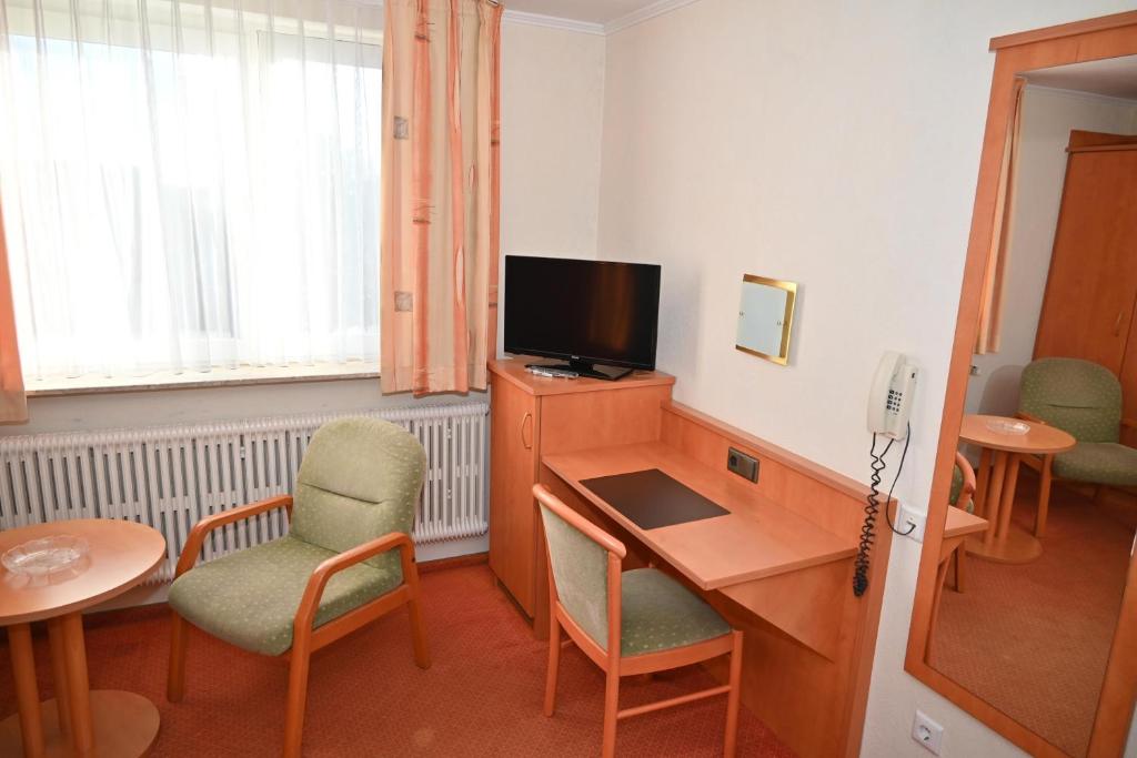 TV a/nebo společenská místnost v ubytování Hotel Passat