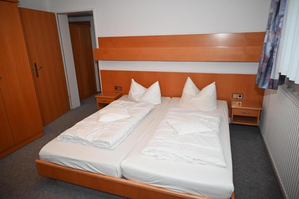Postel nebo postele na pokoji v ubytování Hotel Passat