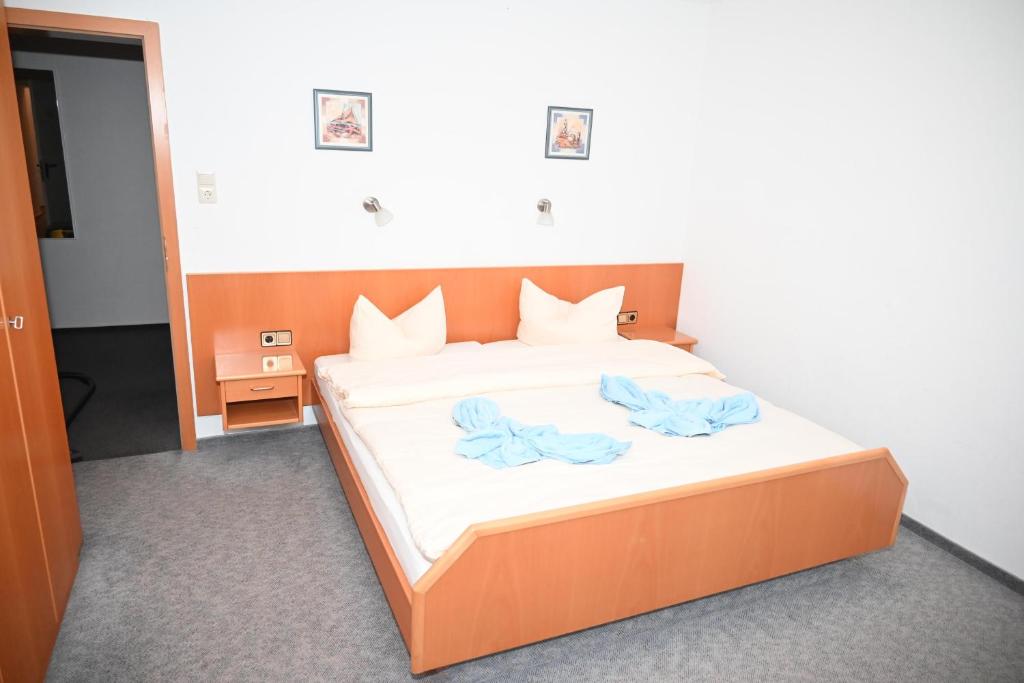 Postel nebo postele na pokoji v ubytování Hotel Passat