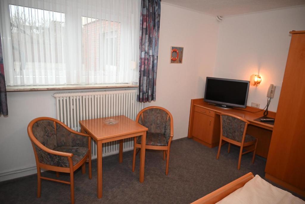 TV a/nebo společenská místnost v ubytování Hotel Passat