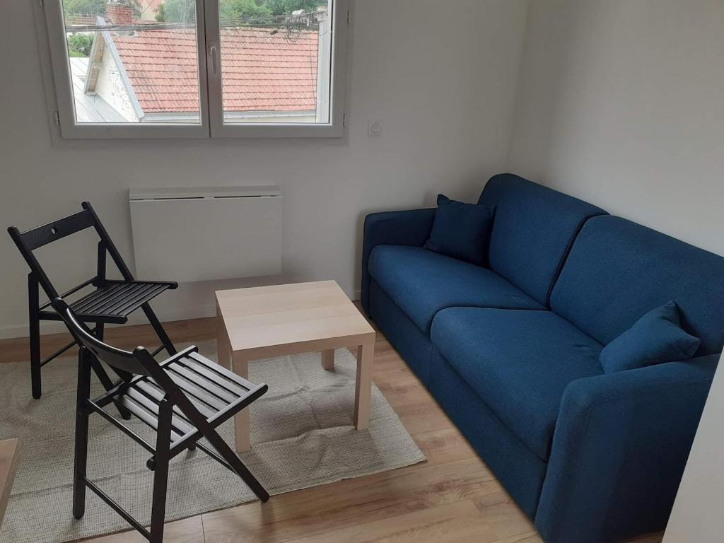 Et opholdsområde på Studio 16m2 equipé