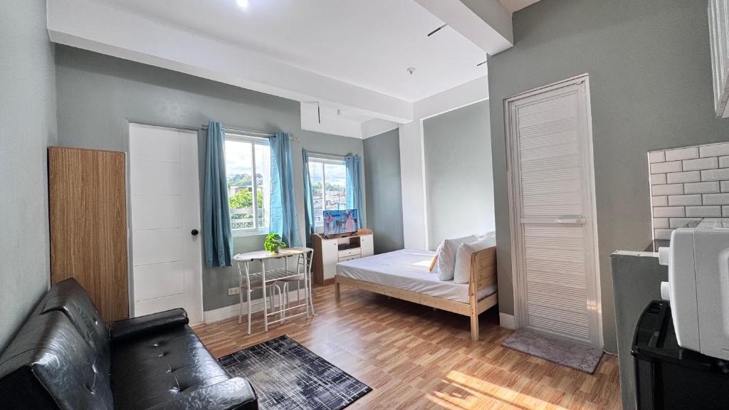 Postel nebo postele na pokoji v ubytování Bangketa Apartments