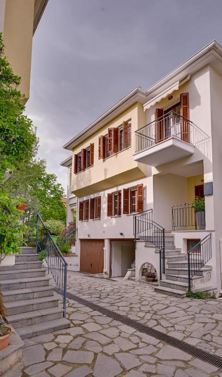 a building with stairs leading up to it at Harmony villa - Ioannina castle in Ioannina