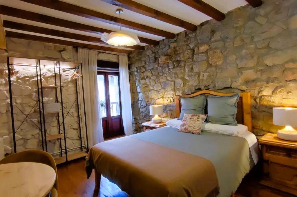 Postel nebo postele na pokoji v ubytování Posada La Dalia