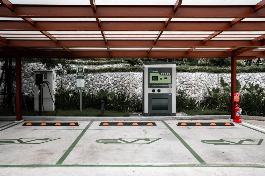 a gas station with a machine in a parking lot at InterContinental Phuket Resort by IHG in Kamala Beach