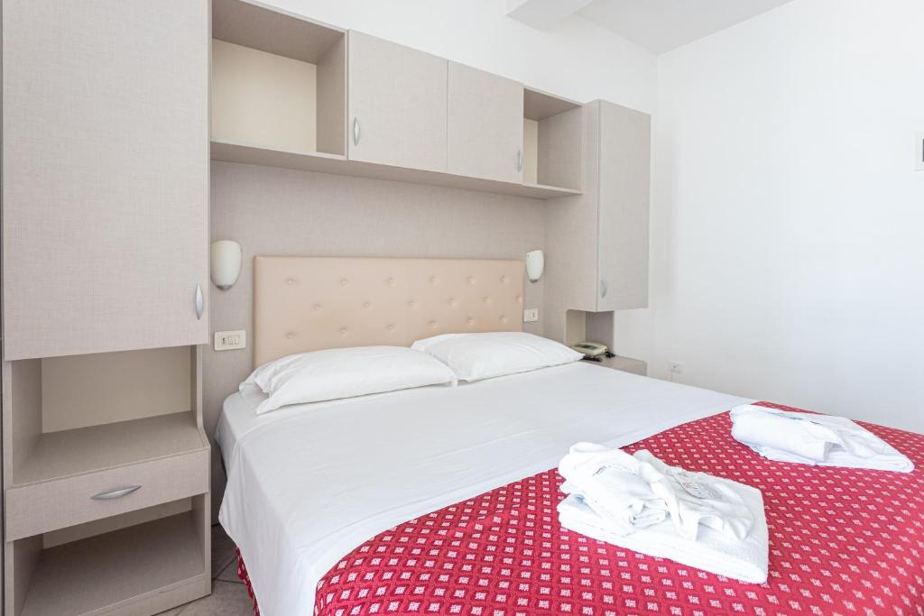 Postel nebo postele na pokoji v ubytování Hotel Blumen