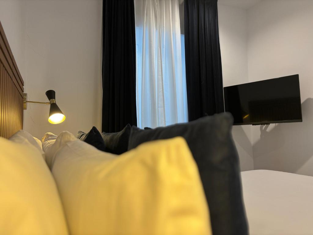 TV a/nebo společenská místnost v ubytování Arenal Suites Bilbao