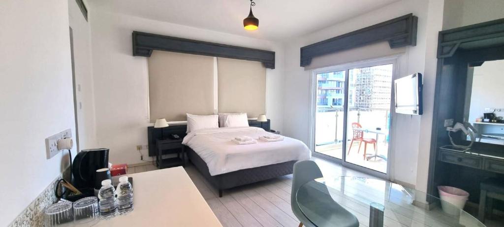 Postel nebo postele na pokoji v ubytování TSANotel