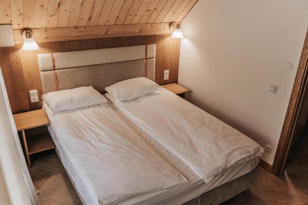 Łóżko lub łóżka w pokoju w obiekcie Jabłonki Resort&Spa