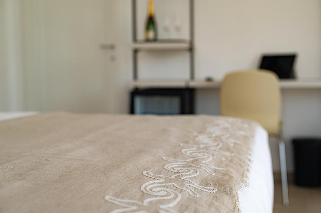 Postel nebo postele na pokoji v ubytování CALLIA ROOMS PROCIDA