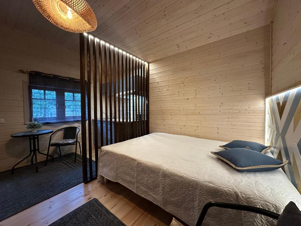 Postel nebo postele na pokoji v ubytování Teeveere Sea house