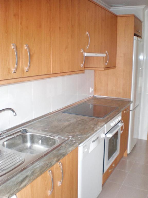 Kuchyňa alebo kuchynka v ubytovaní Comfort Apartment Cirueña + Pool