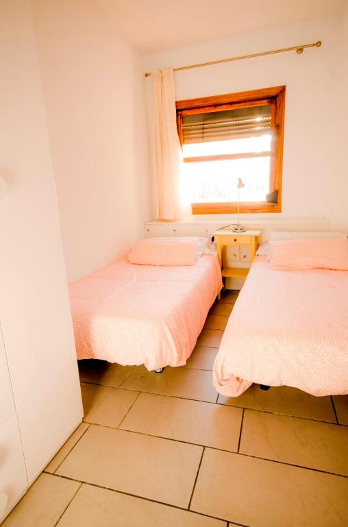 Posteľ alebo postele v izbe v ubytovaní Gálica 103