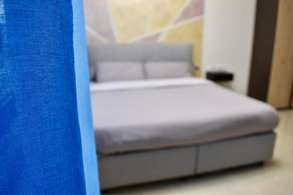 Postel nebo postele na pokoji v ubytování Eden Guest House