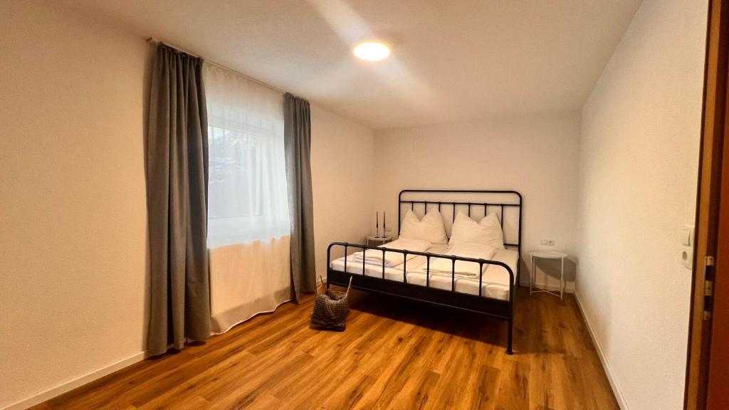 Postel nebo postele na pokoji v ubytování Apart Alm