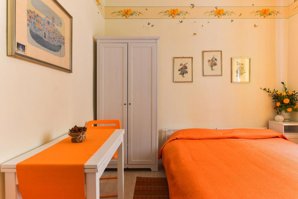Posteľ alebo postele v izbe v ubytovaní B&B All'Ombra di San Pietro