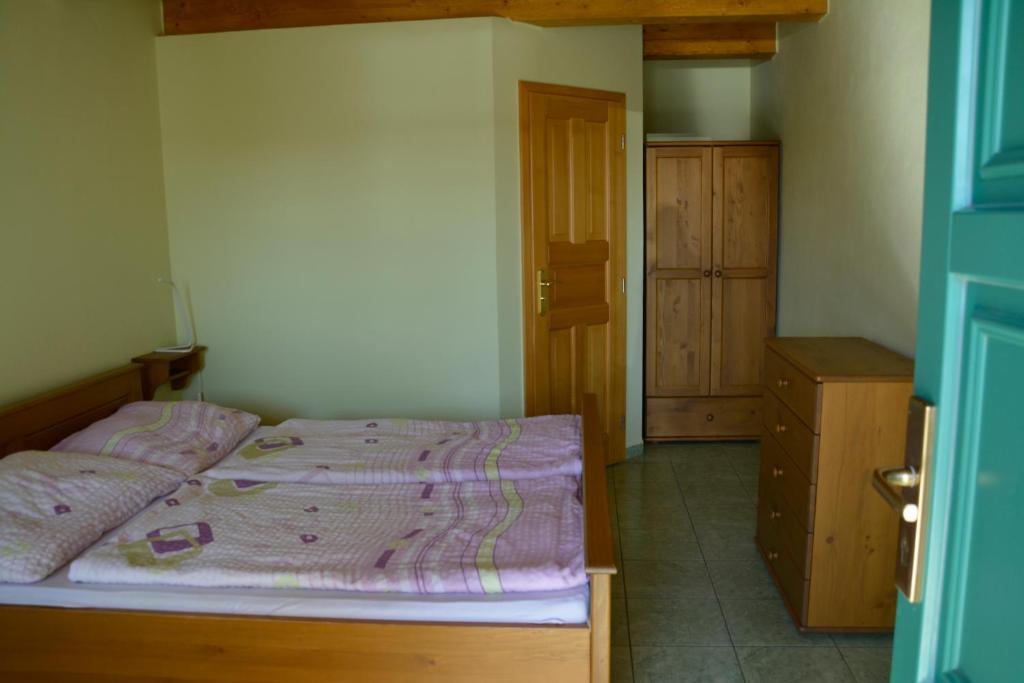 Postel nebo postele na pokoji v ubytování Vinařský dům Sedlec