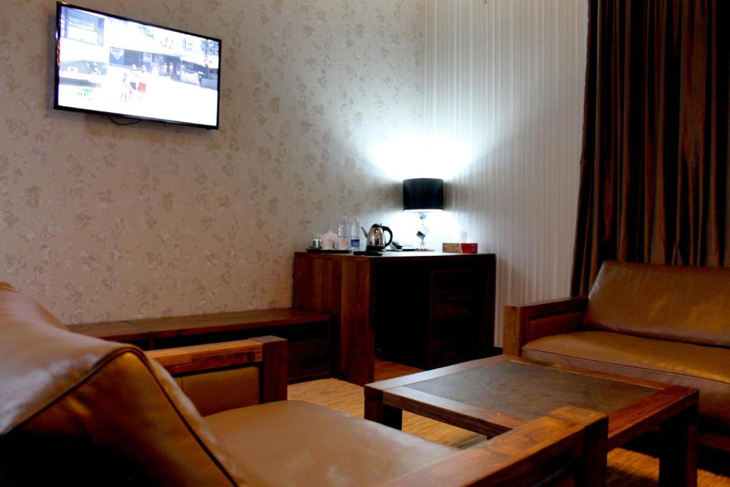 TV a/nebo společenská místnost v ubytování Astor Hotel & Spa