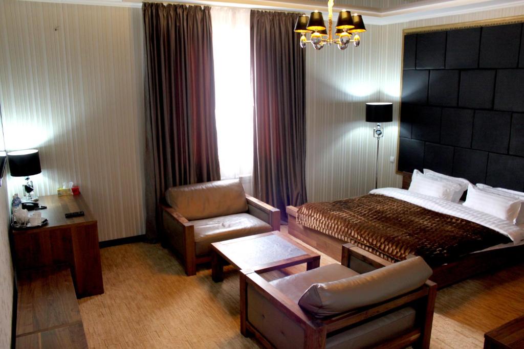 Postel nebo postele na pokoji v ubytování Astor Hotel & Spa