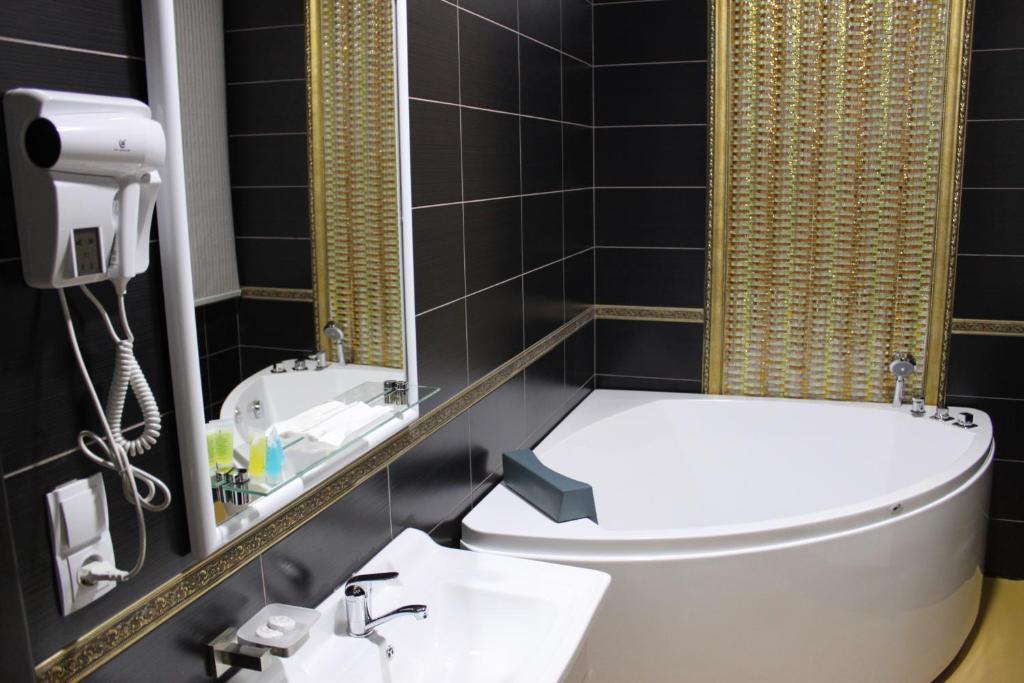 Koupelna v ubytování Astor Hotel & Spa