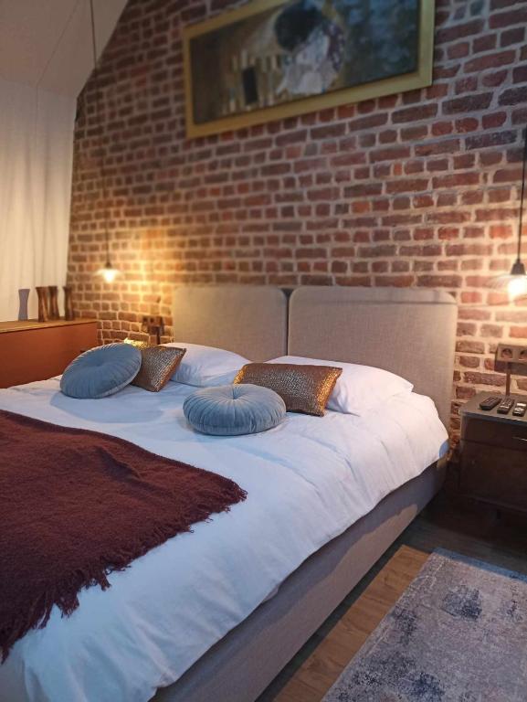 Postel nebo postele na pokoji v ubytování La Ferme de la Cour