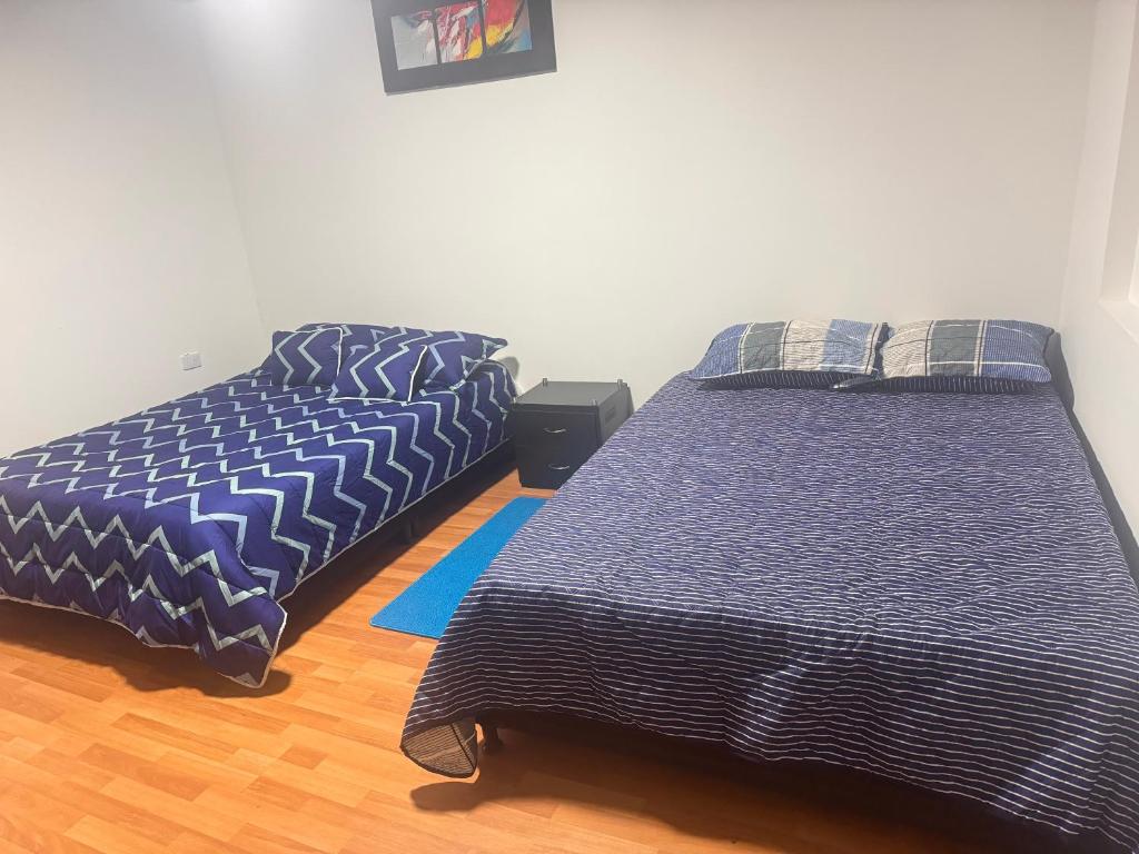 Postel nebo postele na pokoji v ubytování Urbanhost