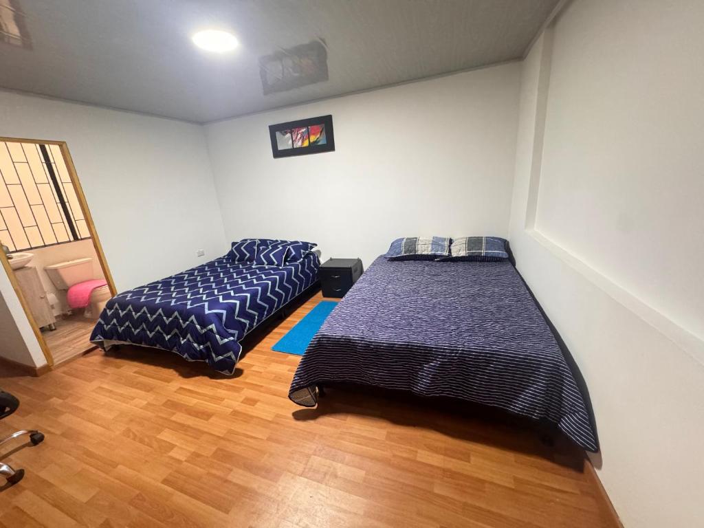 Postel nebo postele na pokoji v ubytování Urbanhost